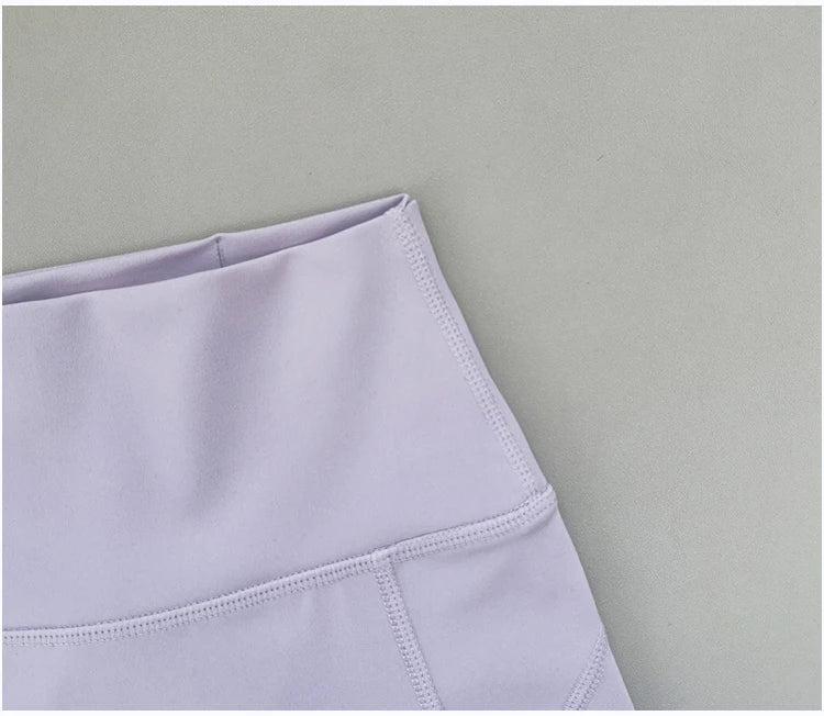 High waisted and hip lifting peach hip sports shorts for women in summer  feeling yoga and fitness pants for running and cycling